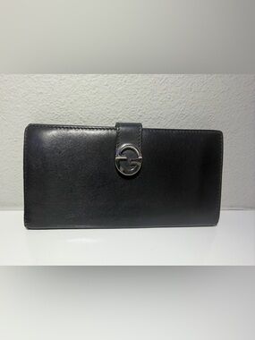 Black Leather Gucci Wallet with Silver 'G' Logo